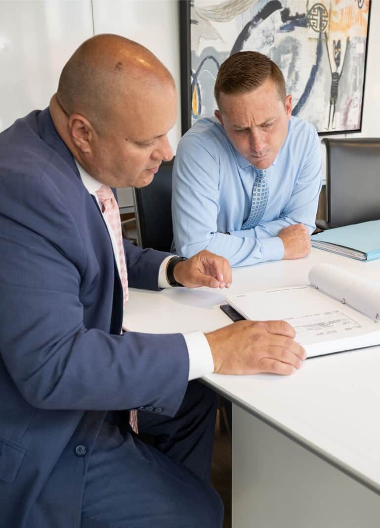 San Diego criminal defense attorney Marc S. Kohnen reviewing a case file