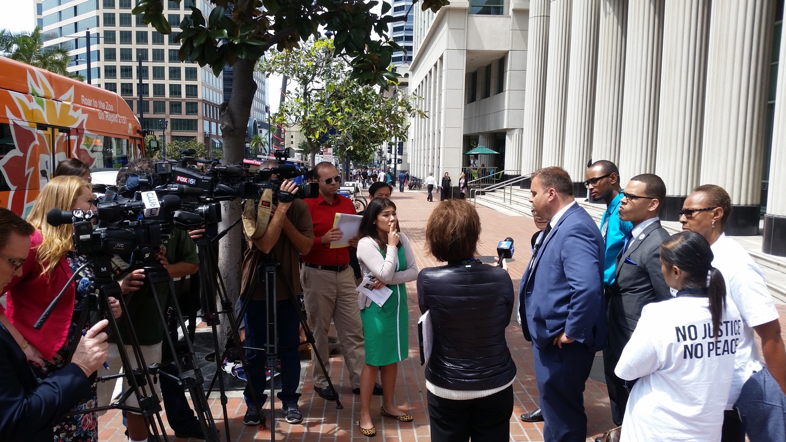 San Diego criminal defense attorney Marc Kohnen addressing the press outside a San Diego courthouse