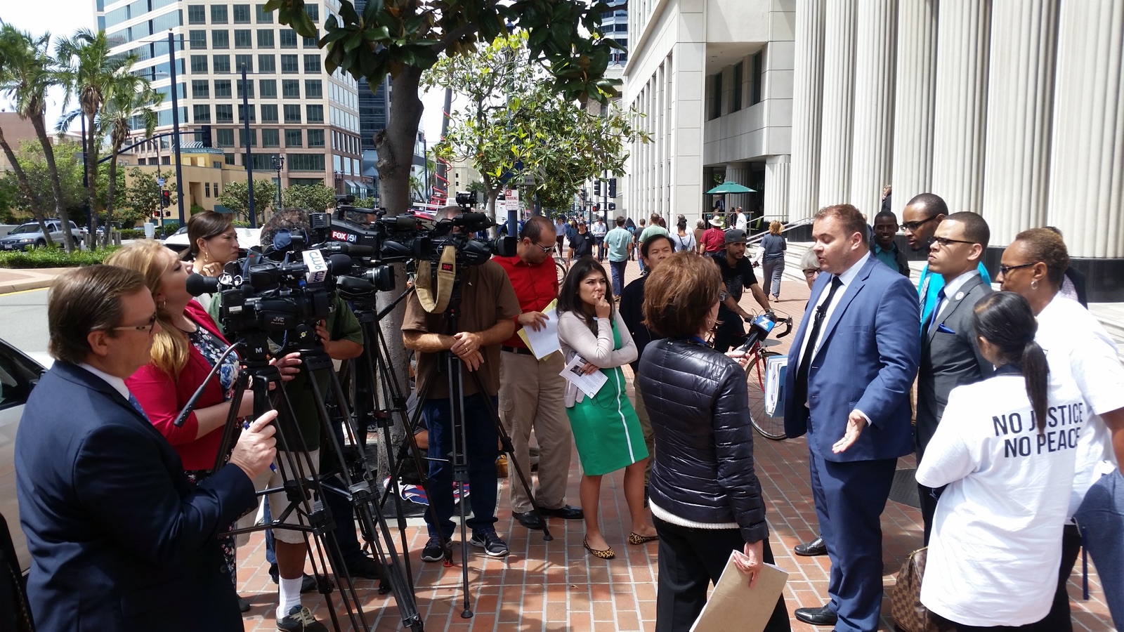 San Diego drug crime attorney Marc Kohnen addressing the press outside the San Diego courthouse