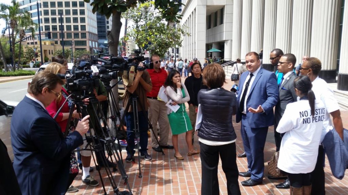 San Diego juvenile defense attorney Marc Kohnen speaking to the press