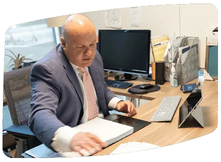 Marc S. Kohnen working at his San Diego criminal defense law office